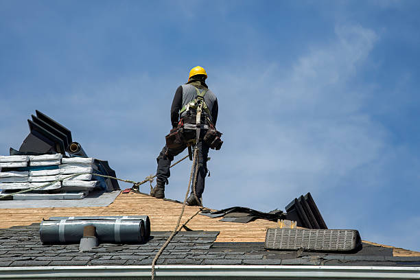 Professional Roofing technician working in Raymond, IL